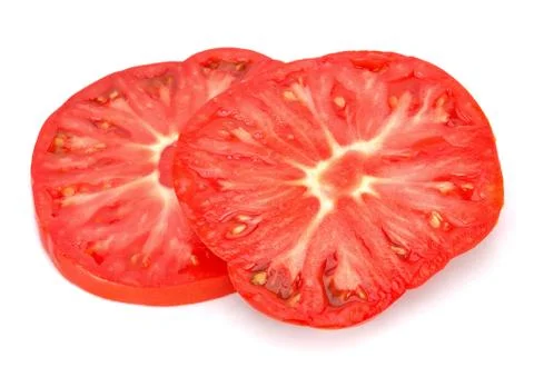 Slice tomato isolated on the white background Stock Photos