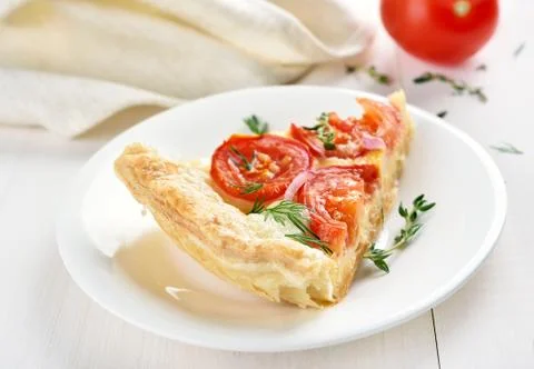 Slice of tomato pie Stock Photos