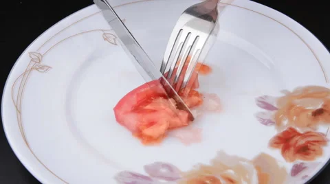 A slice of tomato on the plate time-lapse videos Stock Footage 55789941