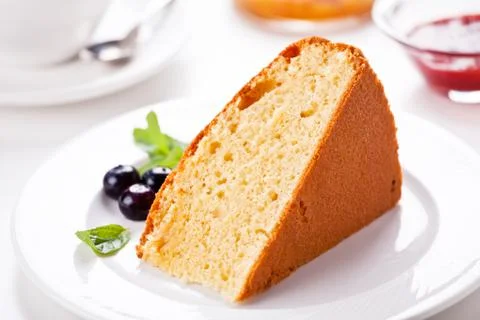 Slice Of Vanilla Cake With Tea Stock Photos