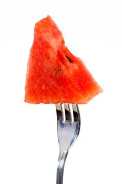 Slice of water-melon with fork on a white background Stock Photos
