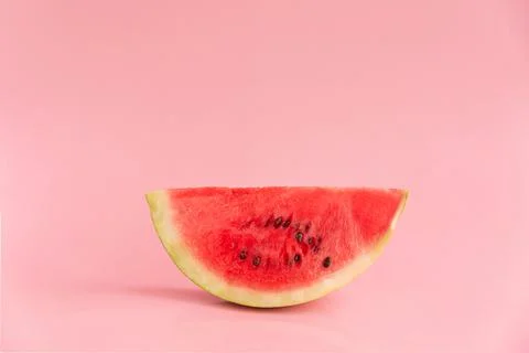 Slice of watermelon isolated on pink background Stock Photos
