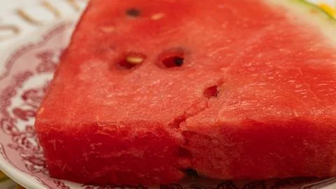 Slice of watermelon on the plate Stock Photos