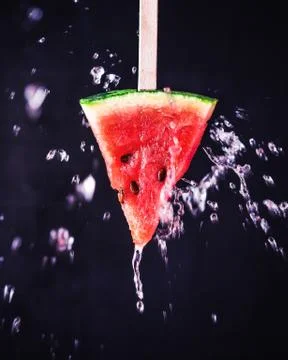 Slice of watermelon on a stick Stock Photos