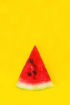 Slice of watermelon on a yellow background Foto stock