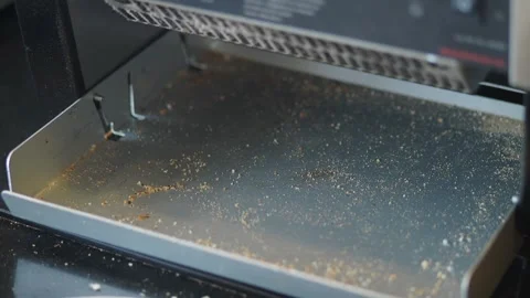 Slice of White Bread Falling into Toaster Crumb Tray Stock Footage 336770403