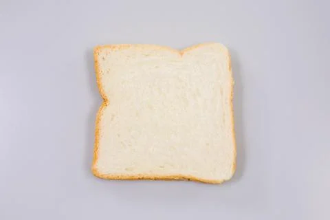 Slice of white bread isolated on white Stock Photos
