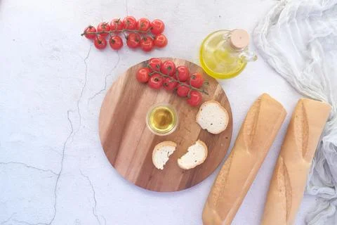Slice of whole meal bread and olive oil on table Foto stock