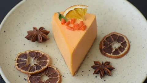 A slice of yellow cheesecake cake flavored with lemon and passion fruit Stock Footage 311335334