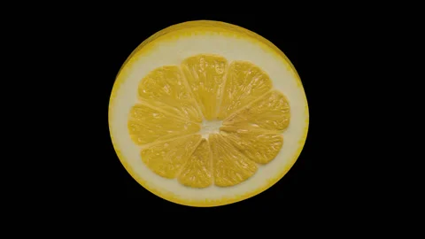 A slice of yellow lemon rotates around its axis, the alpha channel, Video stock 133738935