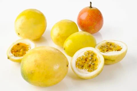 Slice yellow passion fruit Stock Photos