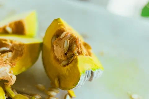 Slice of yellow pumpkin Stock Photos