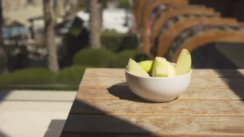 Sliced apples on pool background Stock Footage 74919054