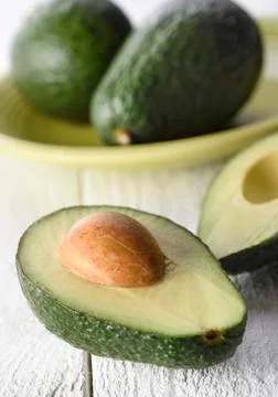 Sliced avocado on a white background Stock Photos