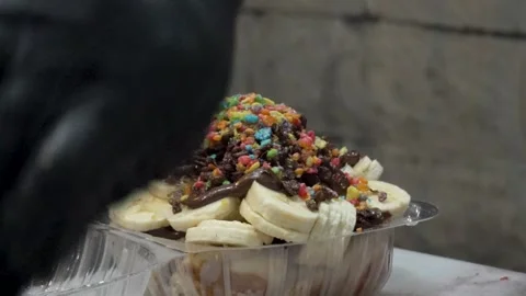 Sliced Bananas Drizzled With Nutella Stock Footage 295844581