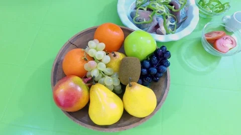 Sliced barracuda with vegetables. Stock-Footage 76851602