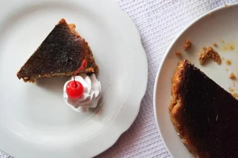 Sliced of Basque Burnt Cheese Cake, a Spanish Traditional Cheesecake. Baked.. Stock Photos