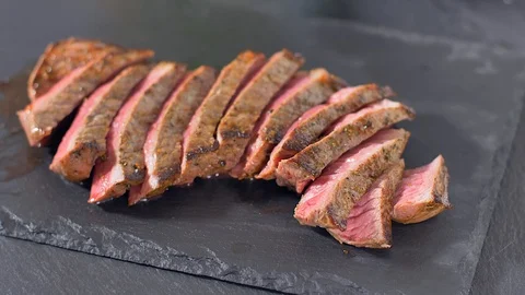 Sliced beef steak medium culinary Stock Footage 114076563