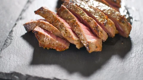 Sliced beef steak medium culinary Stock Footage 114076612