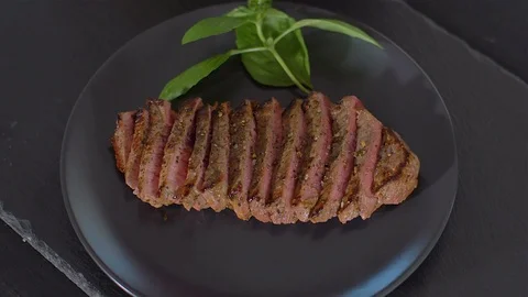 Sliced beef steak medium culinary Stock Footage 114076891