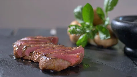 Sliced beef steak medium culinary Stock Footage 114077987