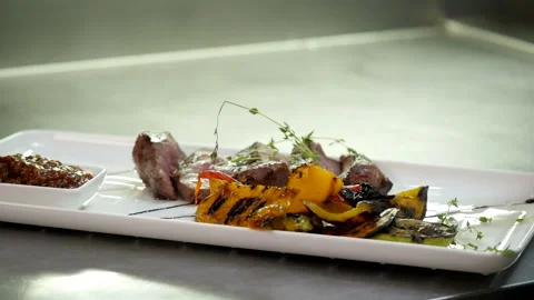 Sliced Beef Steak with Vegetables Stock Footage 132216565