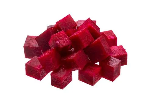 Sliced beetroot cubes isolated on white background Sliced beet closeup, cu... Stock Photos