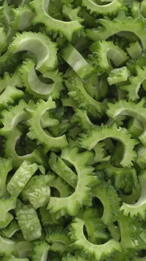 Sliced bitter melon background.  Vertical video. Stock Footage 280764241