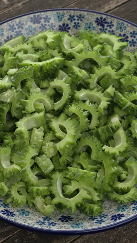 Sliced bitter melon.  Vertical video. Stock Footage 280105720