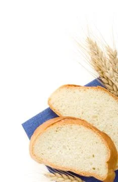 Sliced bread and ears of wheat Stock Photos