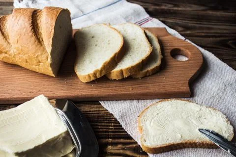 Sliced bread and spread butter Stock Photos
