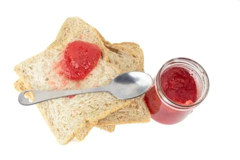 Sliced bread and strawberry jam Stock Photos