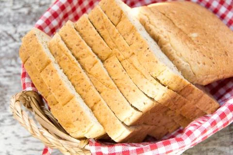 Sliced bread in basket Stock Photos