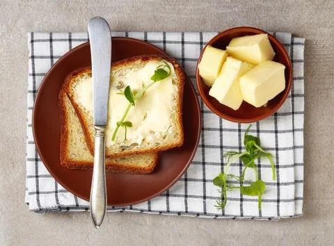 Sliced bread with butter Stock Photos