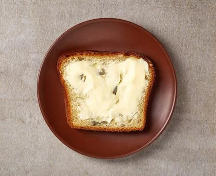 Sliced bread with butter Stock Photos