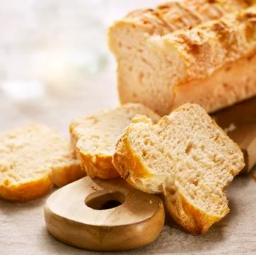 Sliced bread on a chopping board Stock Photos