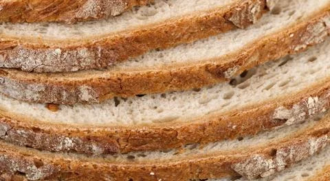 Sliced bread close up. Detail of bread crust. Stock Photos