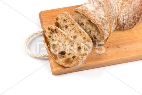 Sliced bread on cutting board Stock Photos