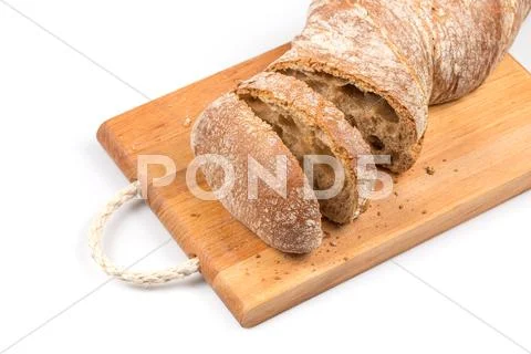 Sliced bread on cutting board Stock Photos