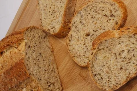 Sliced bread on a  cutting board Stock Photos