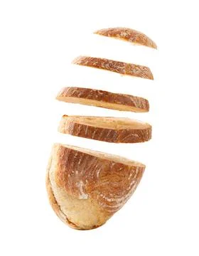Sliced bread falls on a pile close-up on a white background. Isolated Stock Photos