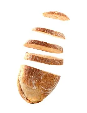 Sliced bread falls on a pile close-up on a white background. Isolated Stock Photos