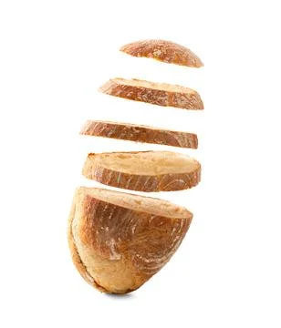 Sliced bread falls on a pile close-up on a white background. Isolated Stock Photos