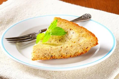 Sliced bread with herb garnish on a plate Stock Photos