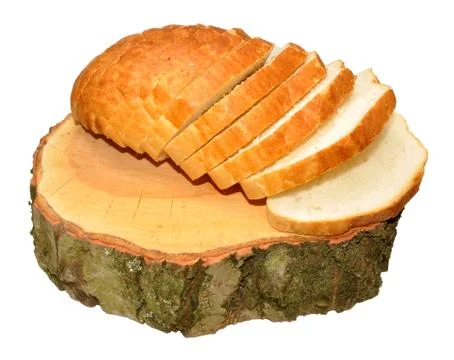 Sliced Bread Loaf On Tree Stump Stock Photos