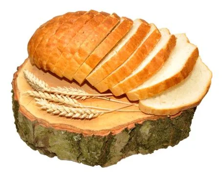 Sliced Bread Loaf On Tree Stump Stock Photos
