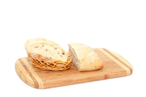 Sliced bread lying on cutting board Stock Photos