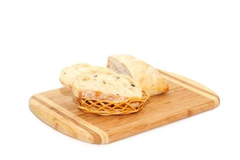 Sliced bread lying on cutting board Stock Photos
