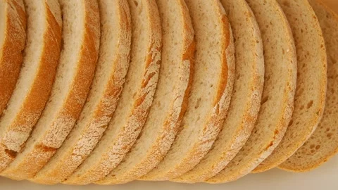 Sliced bread on a plate. Video stock 328441173