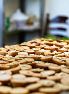 Sliced Bread Spread on a Table for Small Burgers with Ketchup and Sauce Sprea Stock-Fotos